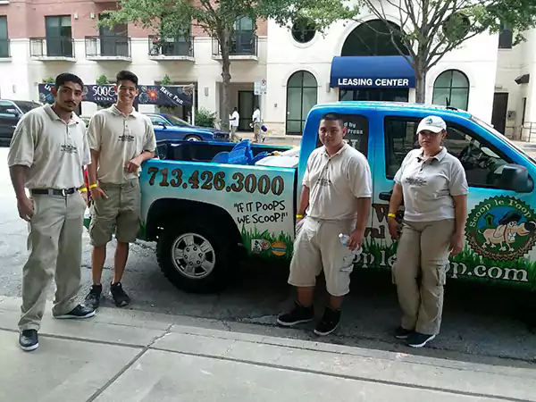 Scoop le Poop Team A few Scoop le Poop Pet Waste Removal Specialists on the job and standing by the company truck.